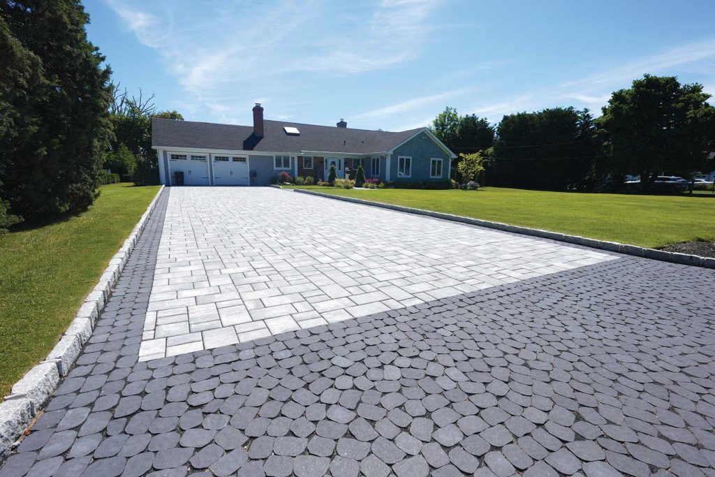 Stamped Concrete Patio vs Pavers: Choosing the Right Surface for Every Outdoor Space